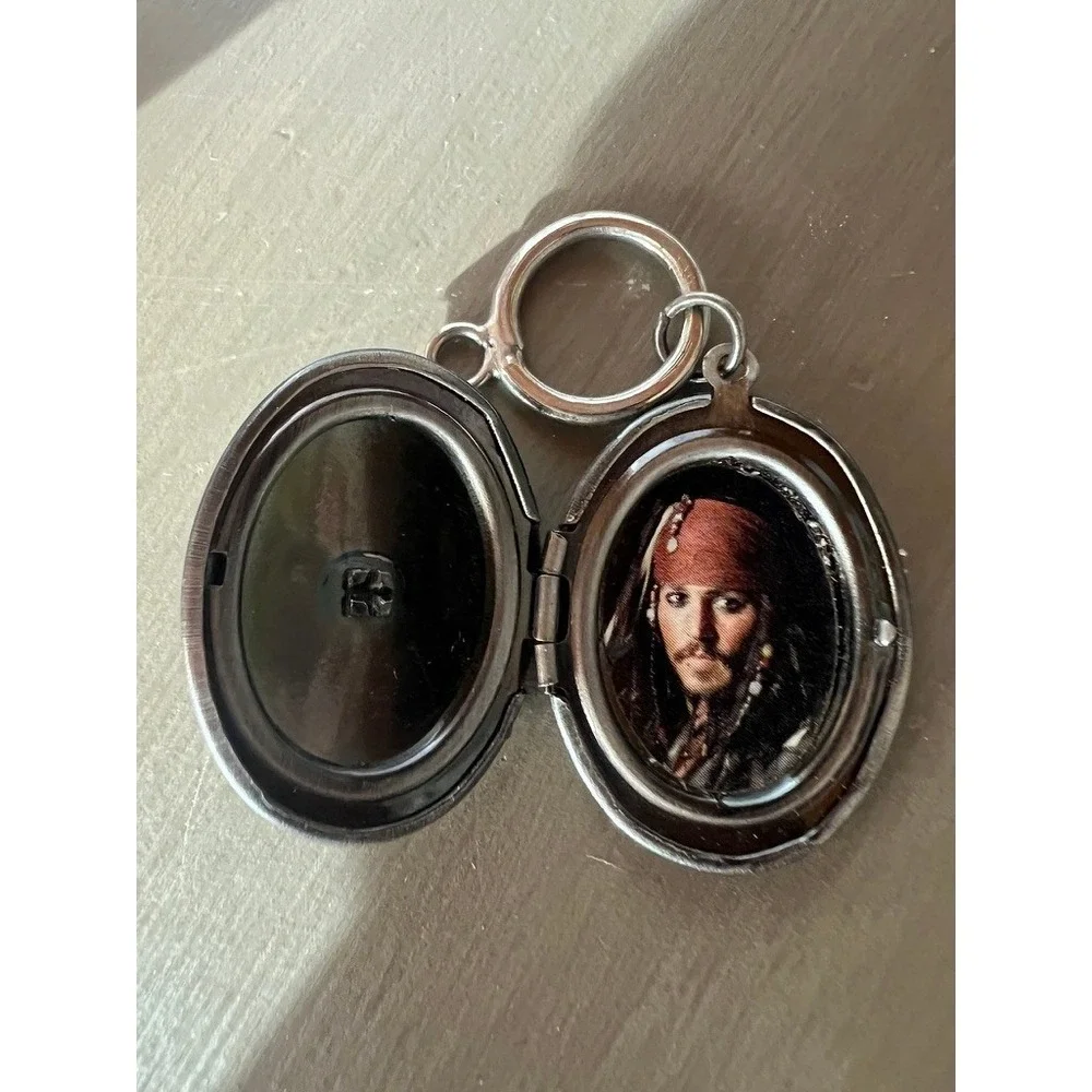 Disney Pirates of the Caribbean Locket Keychain Jack Sparrow Skull Silver Tone